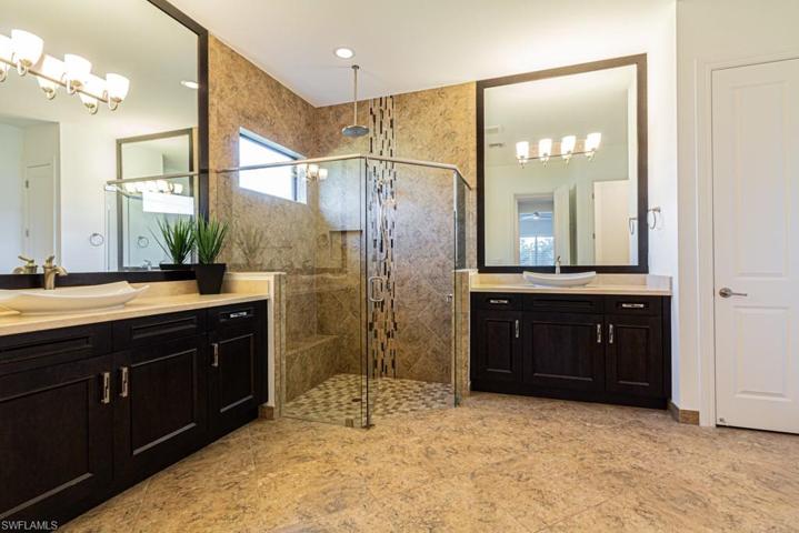 Main bathroom is very spacious-dual vanities, large shower.