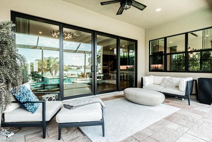Covered lanai area for relaxing and entertaining. Electric sunshade also!