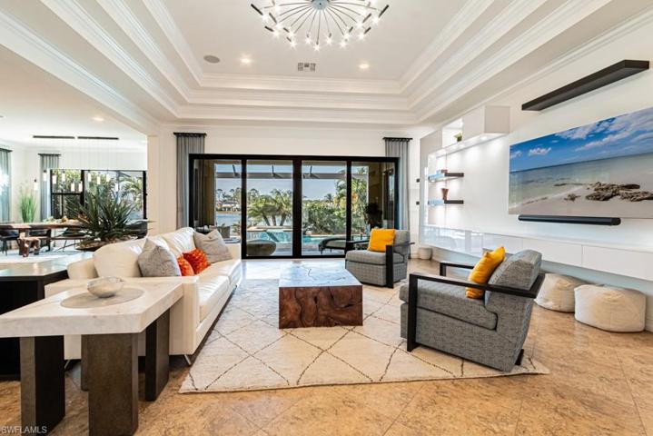 Incredible Living Room, tray ceiling, Italian Built-In shelving with lights and fabulous views!