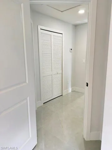 Between bedroom 2, 3, laundry and bathroom