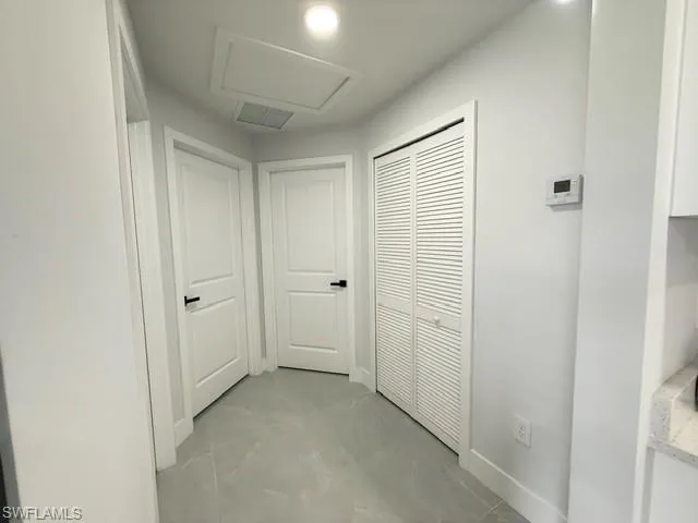 Between bedroom 2, 3 , laundry and bathroom
