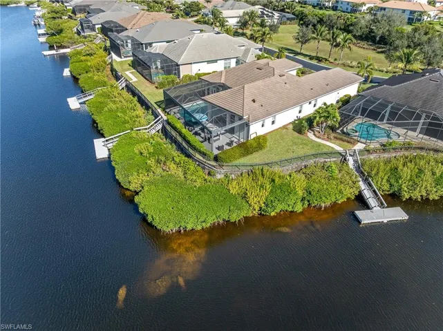 Aerial view of residential area with a nearby body of water