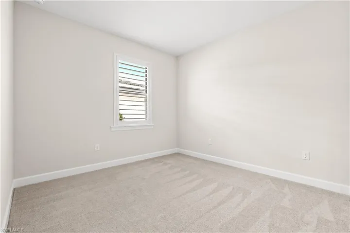 Guest Bedroom with plantation shutters