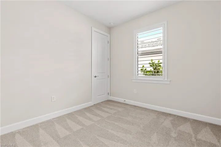 Guest Bedroom with plantation shutters, upgraded carpeting and pad