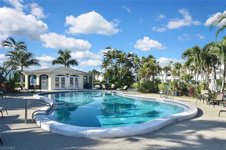 Community pool featuring a patio and french doors