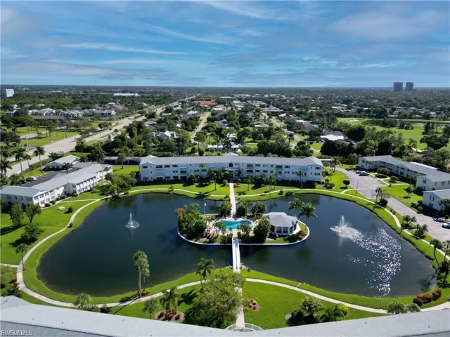 Bird's eye view of apartment complex / building and a large body of water
