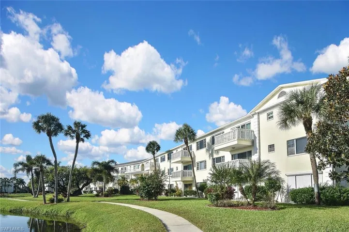 View of home's community featuring a yard
