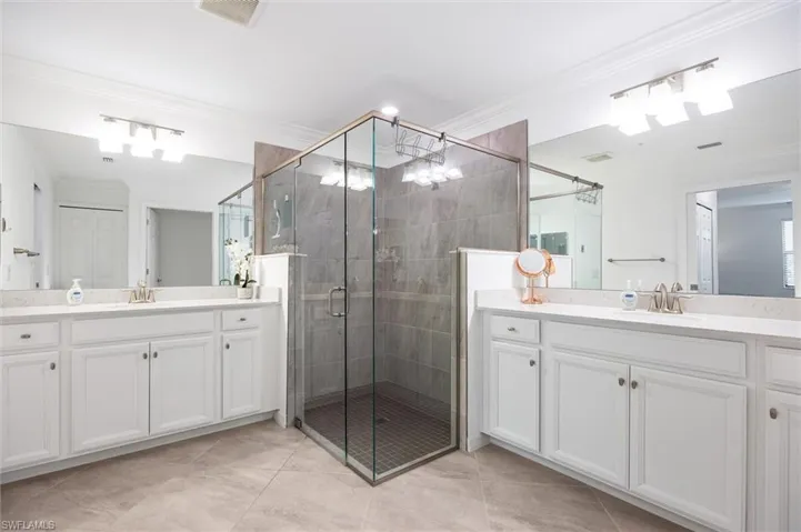 Primary bath separate dual sinks with large shower