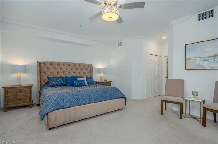 Large primary bedroom with 2 walk in closets