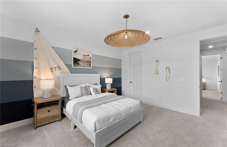 Bedroom featuring light colored carpet and recessed lighting