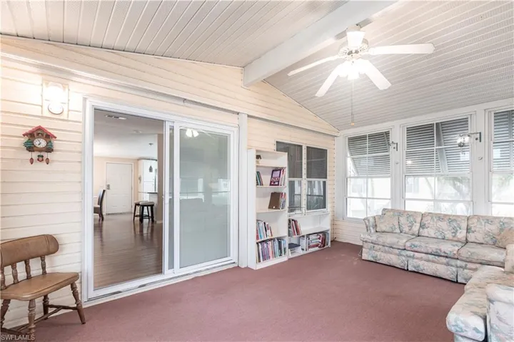 Sunroom with beam ceiling