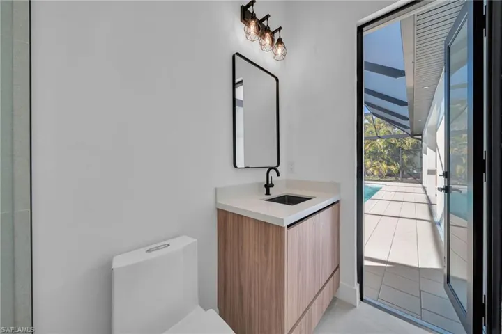 Bathroom with vanity and toilet