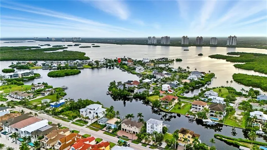 View of urban area featuring nearby suburban area and a large body of water