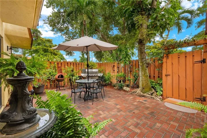 View of terrace featuring area for grilling