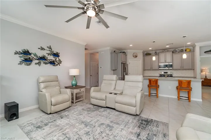 The open living room/kitchen/dining is ideal for entertaining friends & family