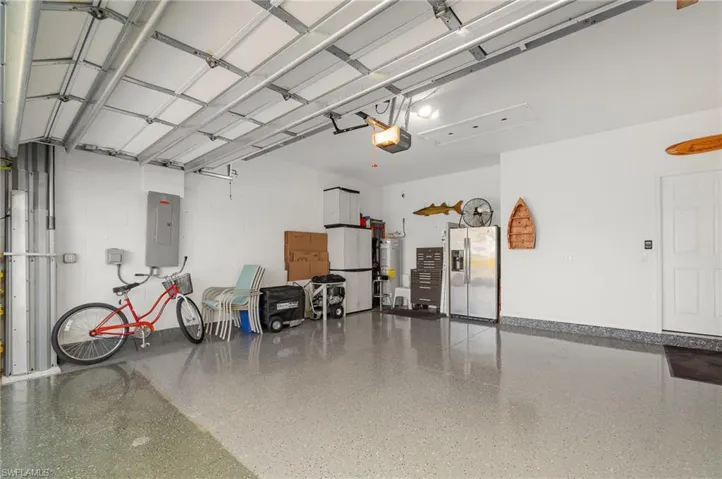 This 20' x 20' two car garage is beyond clean and the shiny epoxy floors make it easy to keep clean