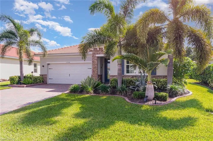 Lush green grass & gorgeous mature landscaping