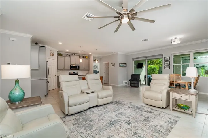 The open living room/kitchen/dining is ideal for entertaining friends & family