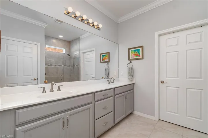 The master bathroom is roomy, with a dual vanity and a water closet for the utmost privacy