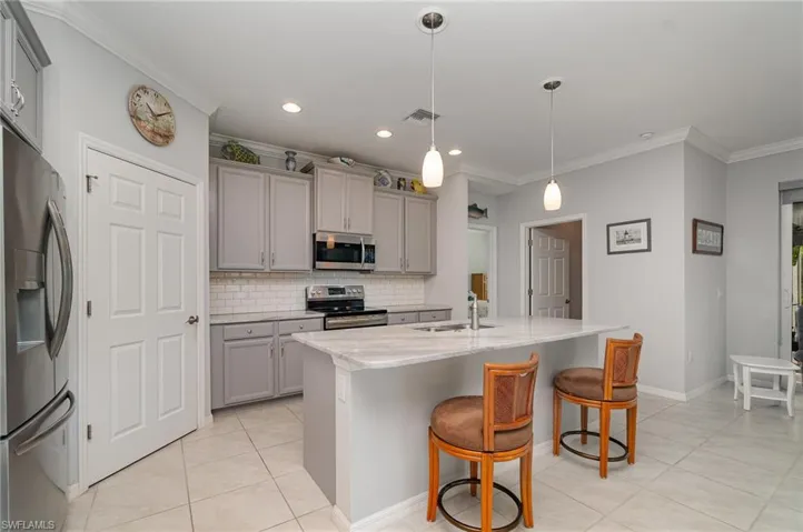 There is a BIG walk-in pantry & plenty of cabinets