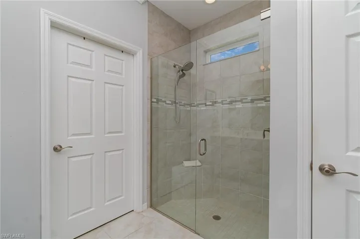 An easy access stand-up shower for safety & convenience