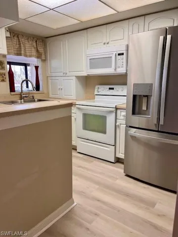 Updated floors in living area and kitchen! 1/2026
