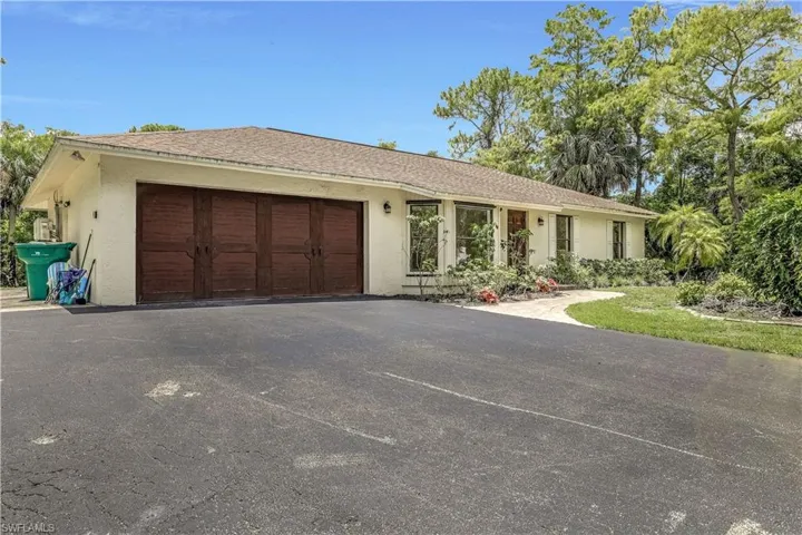 Ranch-style home with a garage