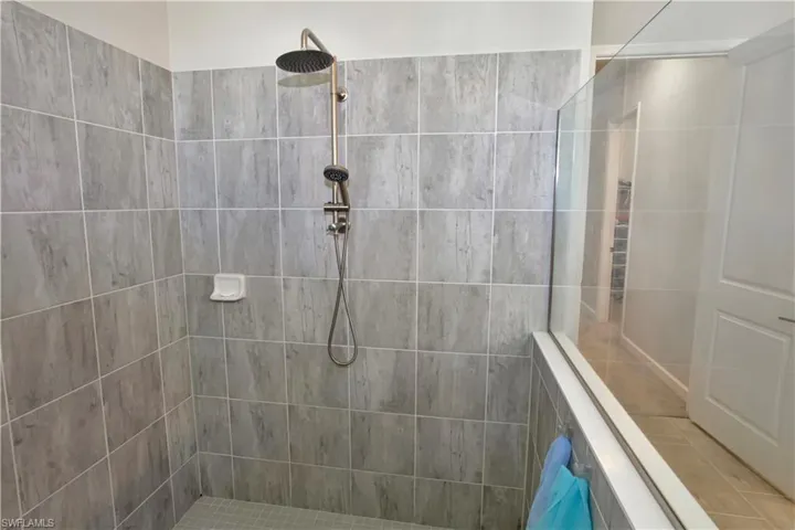 Full bathroom featuring walk in shower
