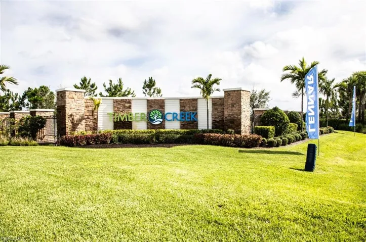 Community sign with a lawn