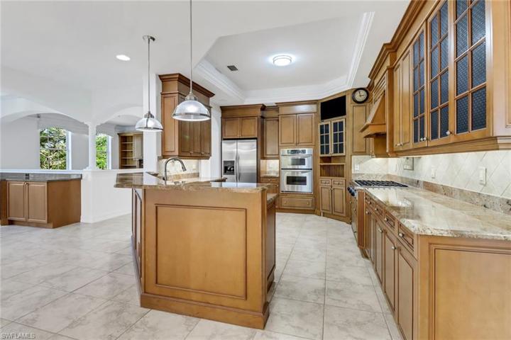 Kitchen with breakfast bar, and walk in pantry