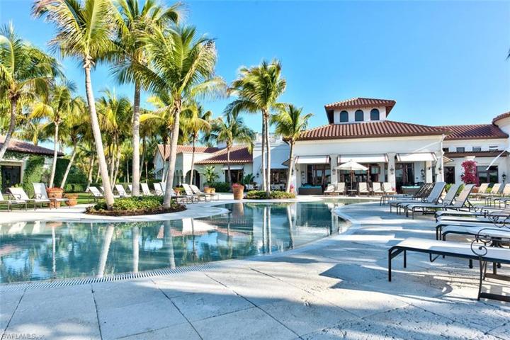 Pool and main clubhouse with fine dining
