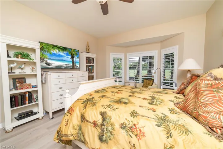 Bedroom featuring light wood finished floors and a ceiling fan