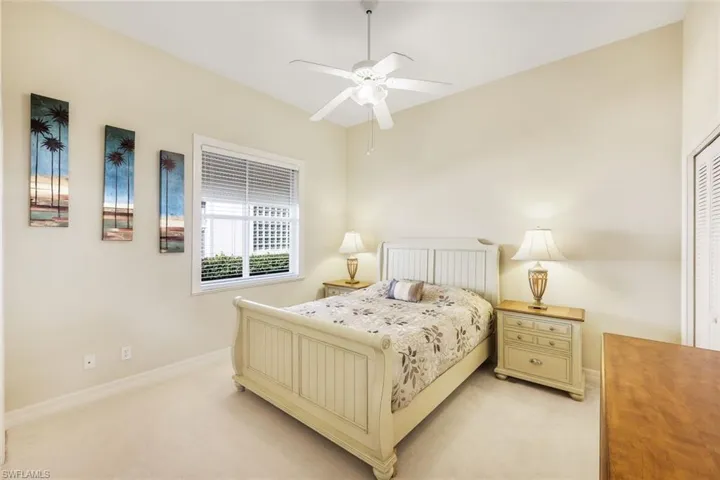 Bedroom with carpet and ceiling fan