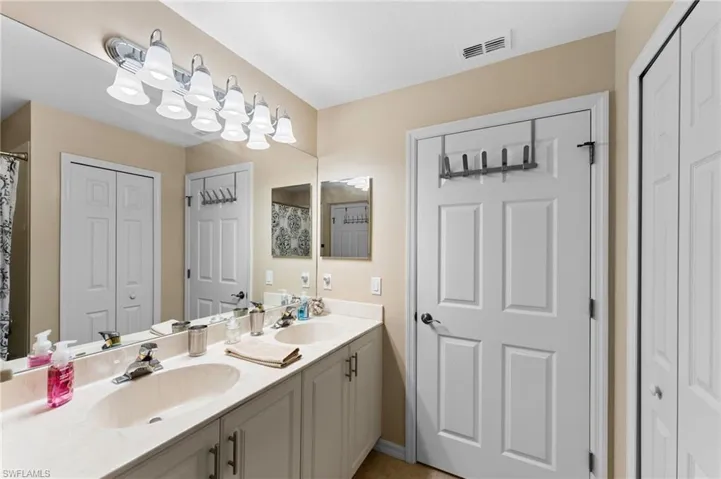 Bathroom featuring double sink vanity