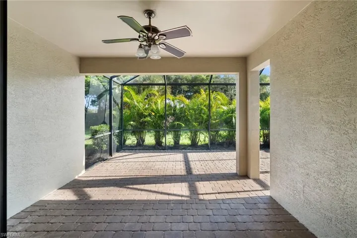 View of patio featuring ceiling fan