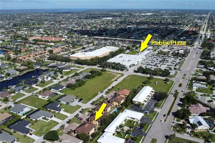 View of property location with shopping centers nearby including Camelot Isles (Publix), Caywest Pavilion, and Bidwell Plaza