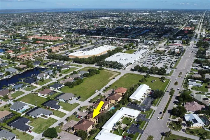 View of property location with shopping centers nearby including Camelot Isles (Publix), Caywest Pavilion, and Bidwell Plaza