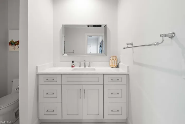 Bathroom with vanity and toilet