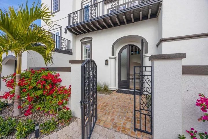 Entrance to property featuring a balcony