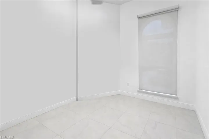 Spare room with baseboards
