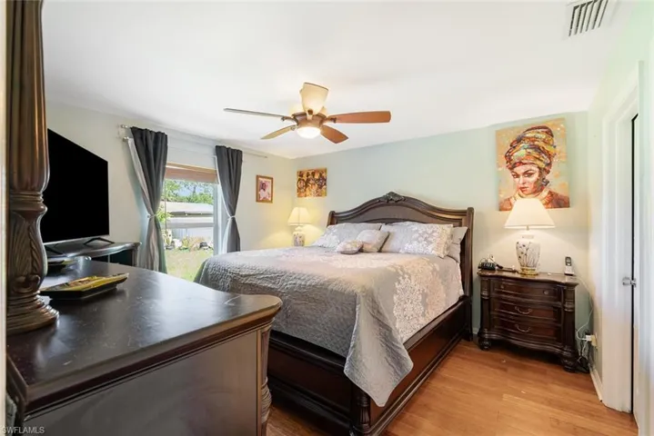Bedroom featuring light wood-type flooring and ceiling fan