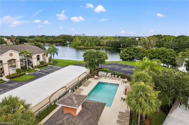 Drone / aerial view with a pool view