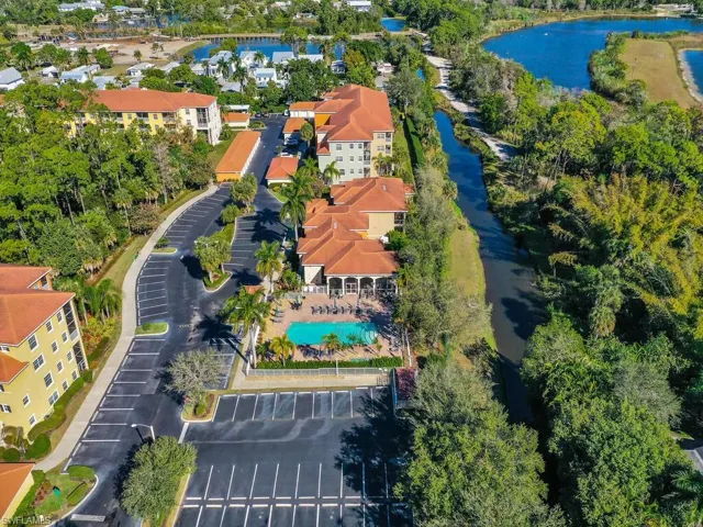 Aerial overview of property's location featuring a nearby body of water