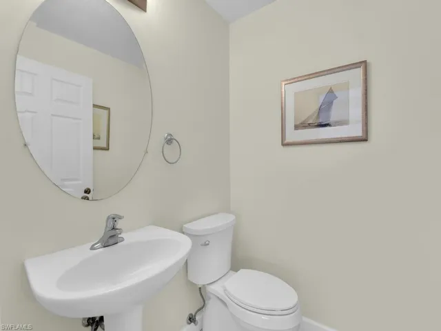 Bathroom featuring toilet and a sink