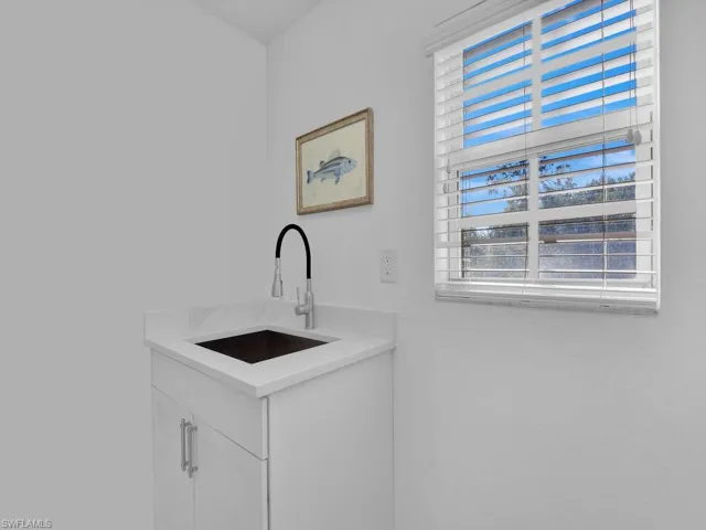 Laundry area featuring a sink