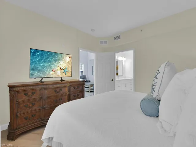Bedroom with light wood-style floors