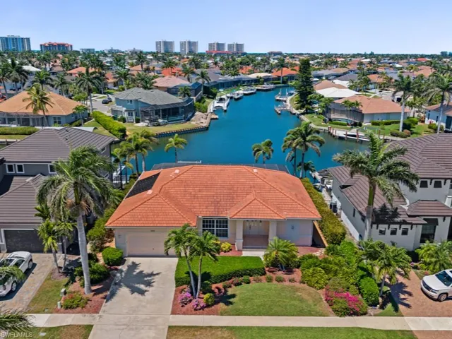 Aerial view with a residential view and a water view
