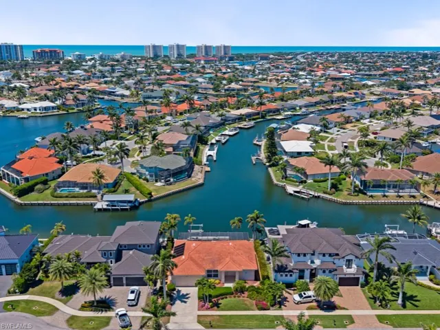 Bird's eye view featuring a water view and a residential view