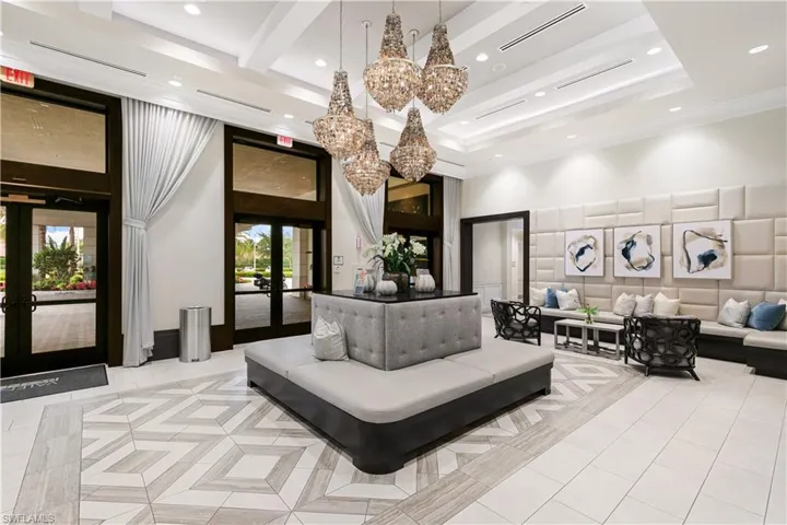 Building lobby with a high ceiling and recessed lighting