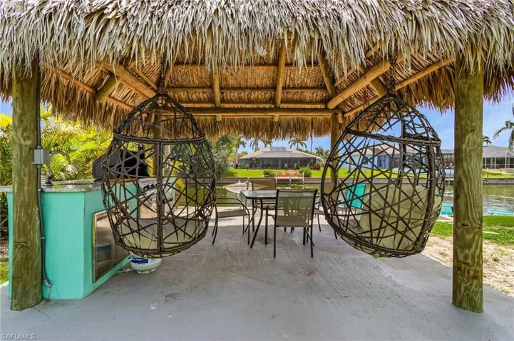 View of patio / terrace featuring a gazebo and outdoor dining area